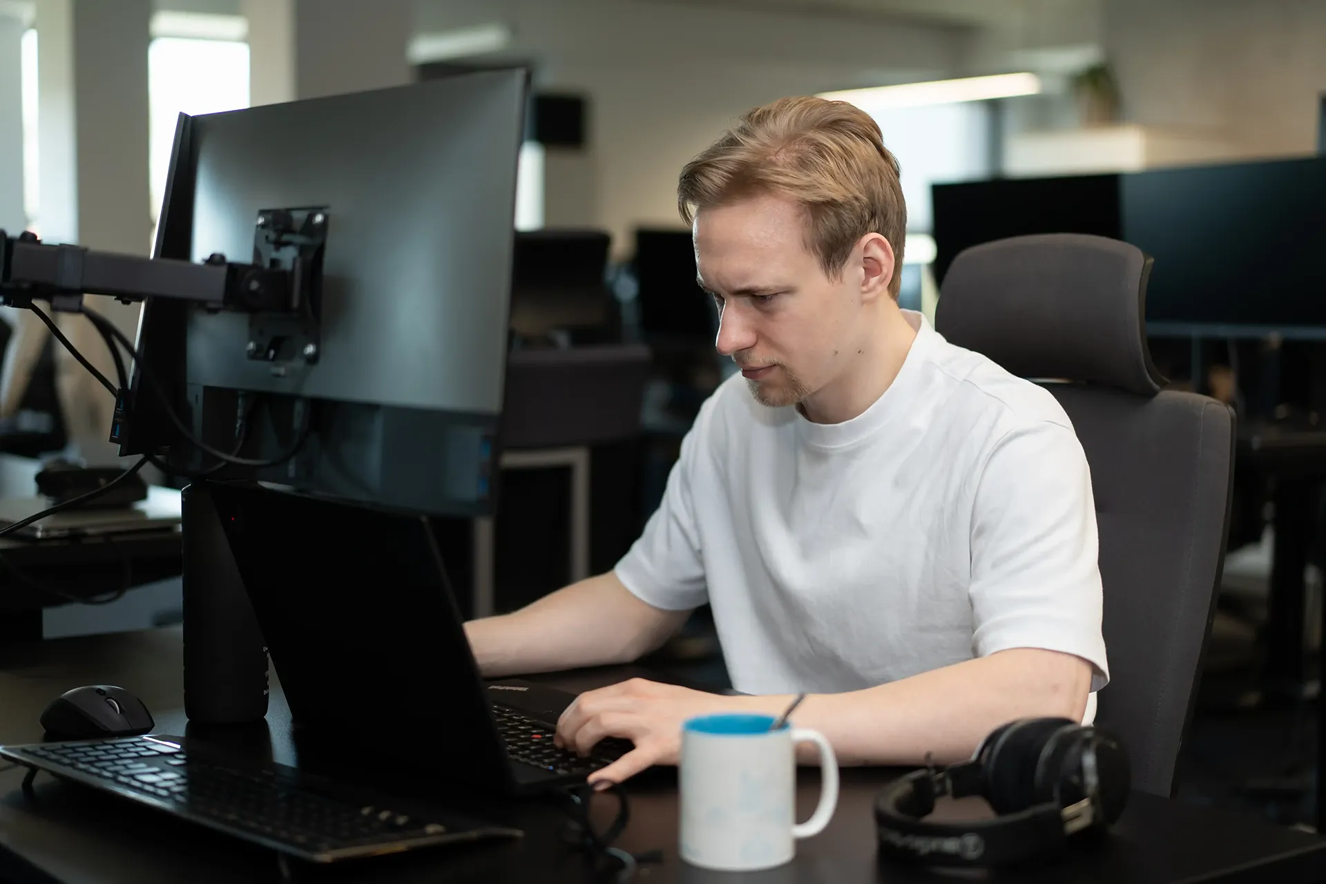 Programmer working on his computer